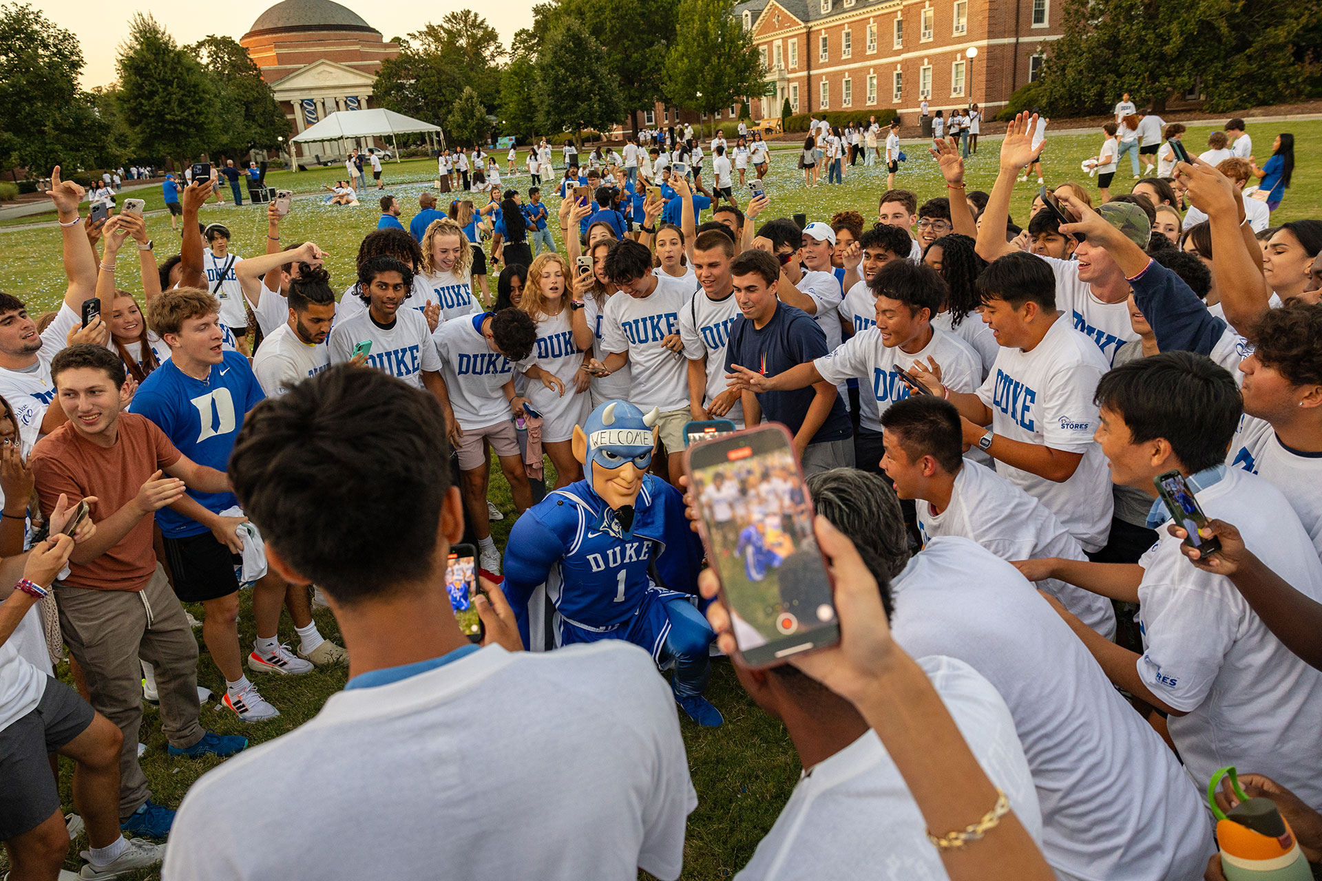 Class of 2028 gather around the Blue Devil prior to the Class photo