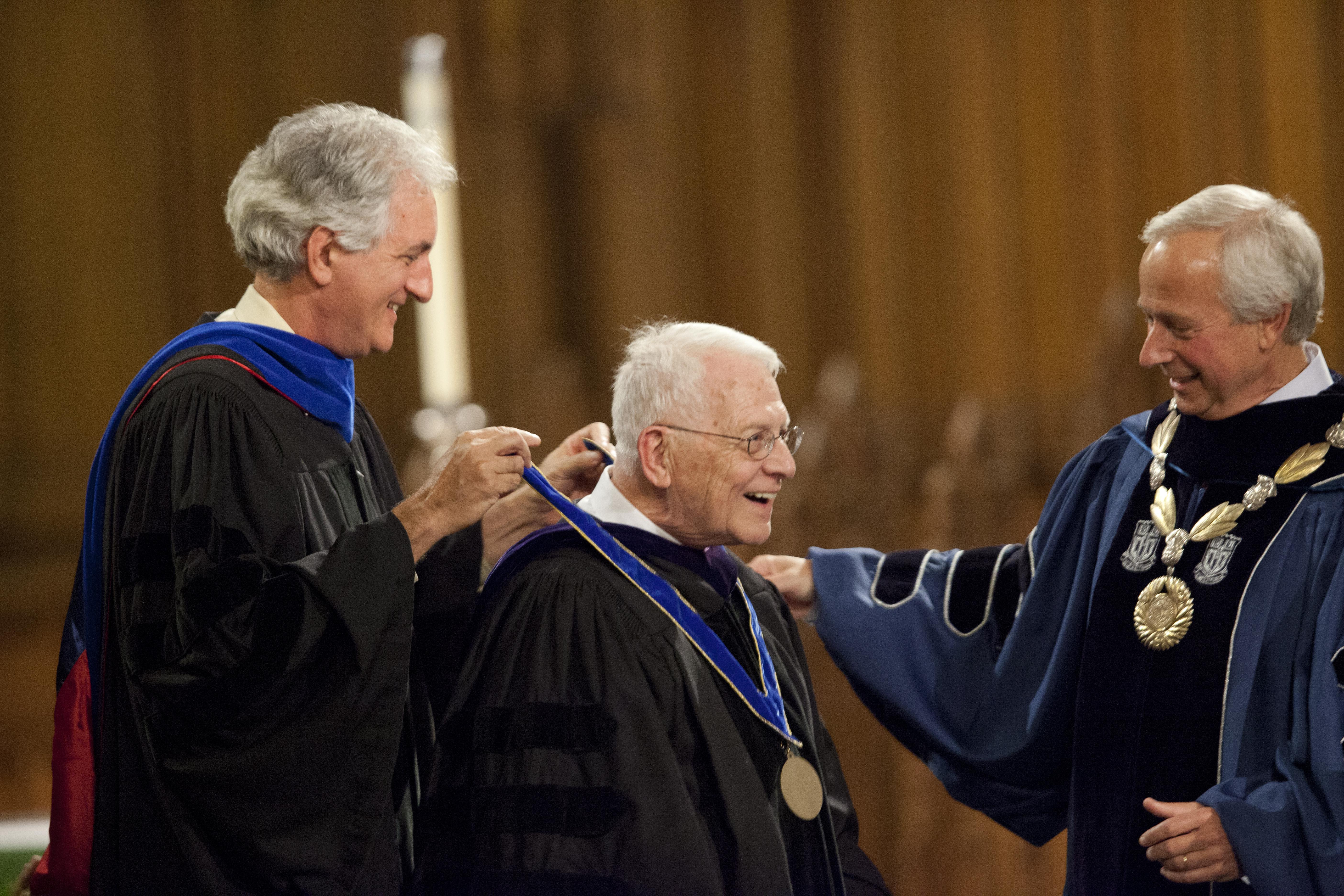 Gerald Wilson receives the University Medal from Academic Council chair Josh Socolar and President Richard H. Brodhead in 2013.