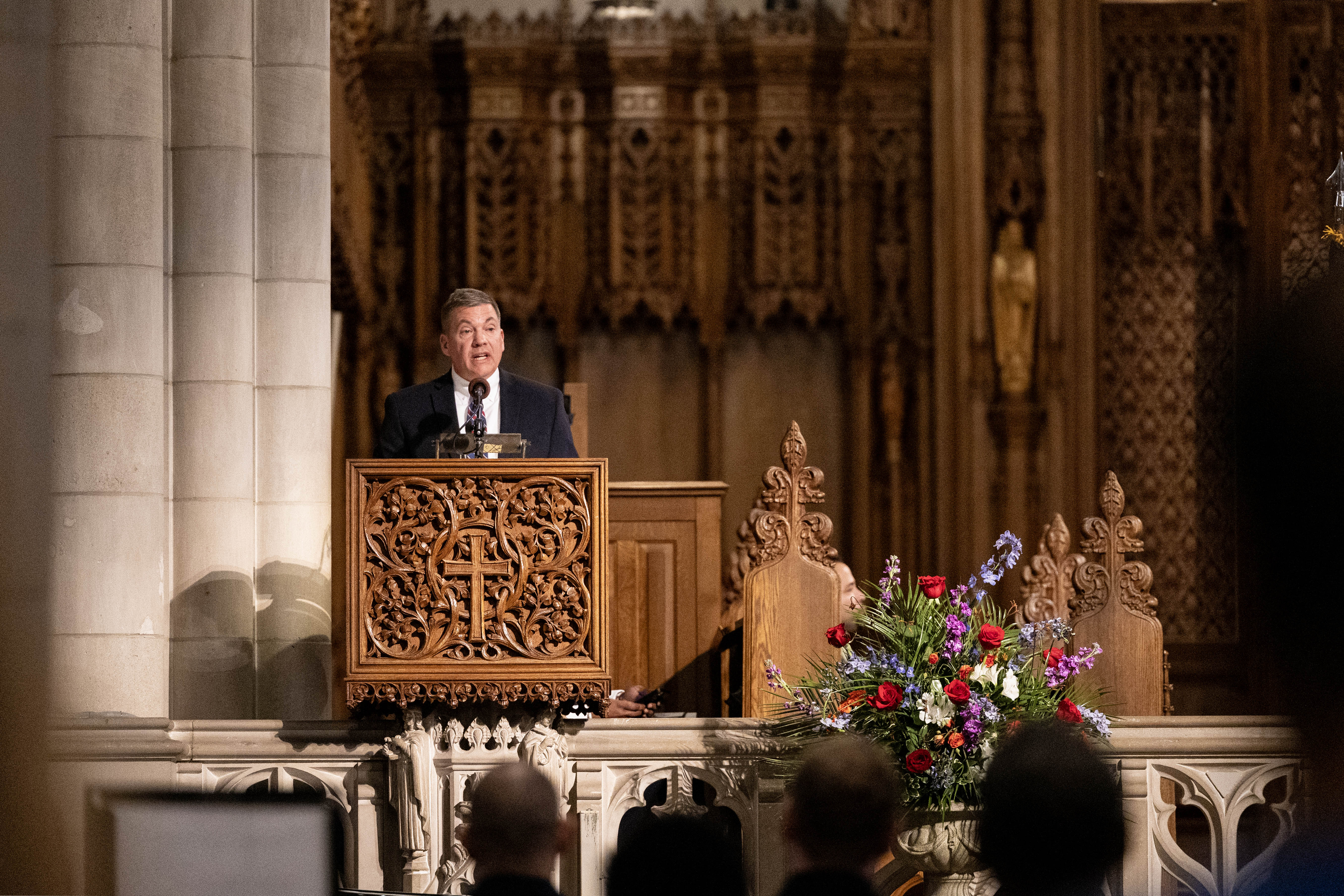 Duke Police Chief John Dailey speaks from a podium at Duke Chapel