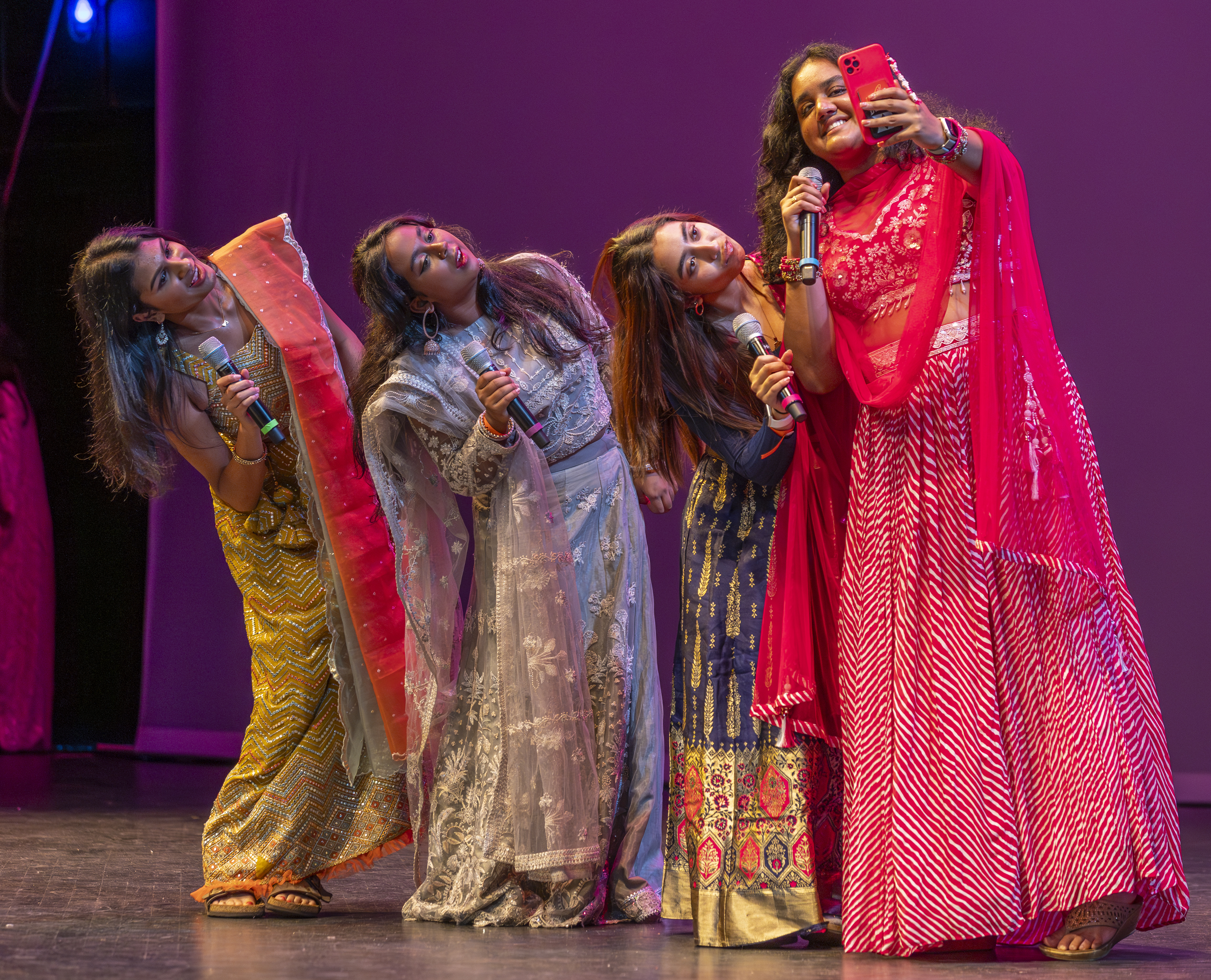 During a skit, students interpret a scene from Barbie