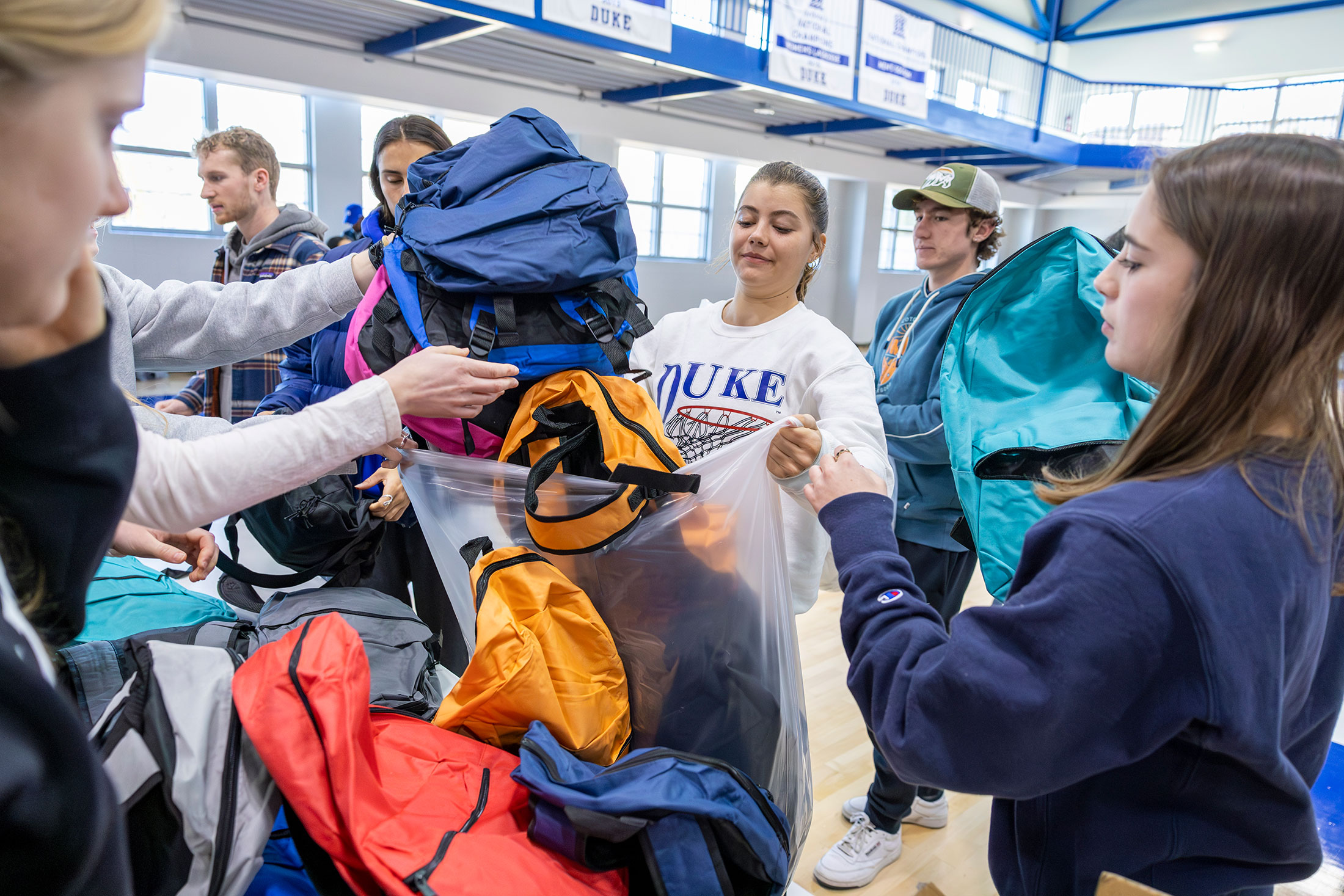 taking backpacks out to be filled
