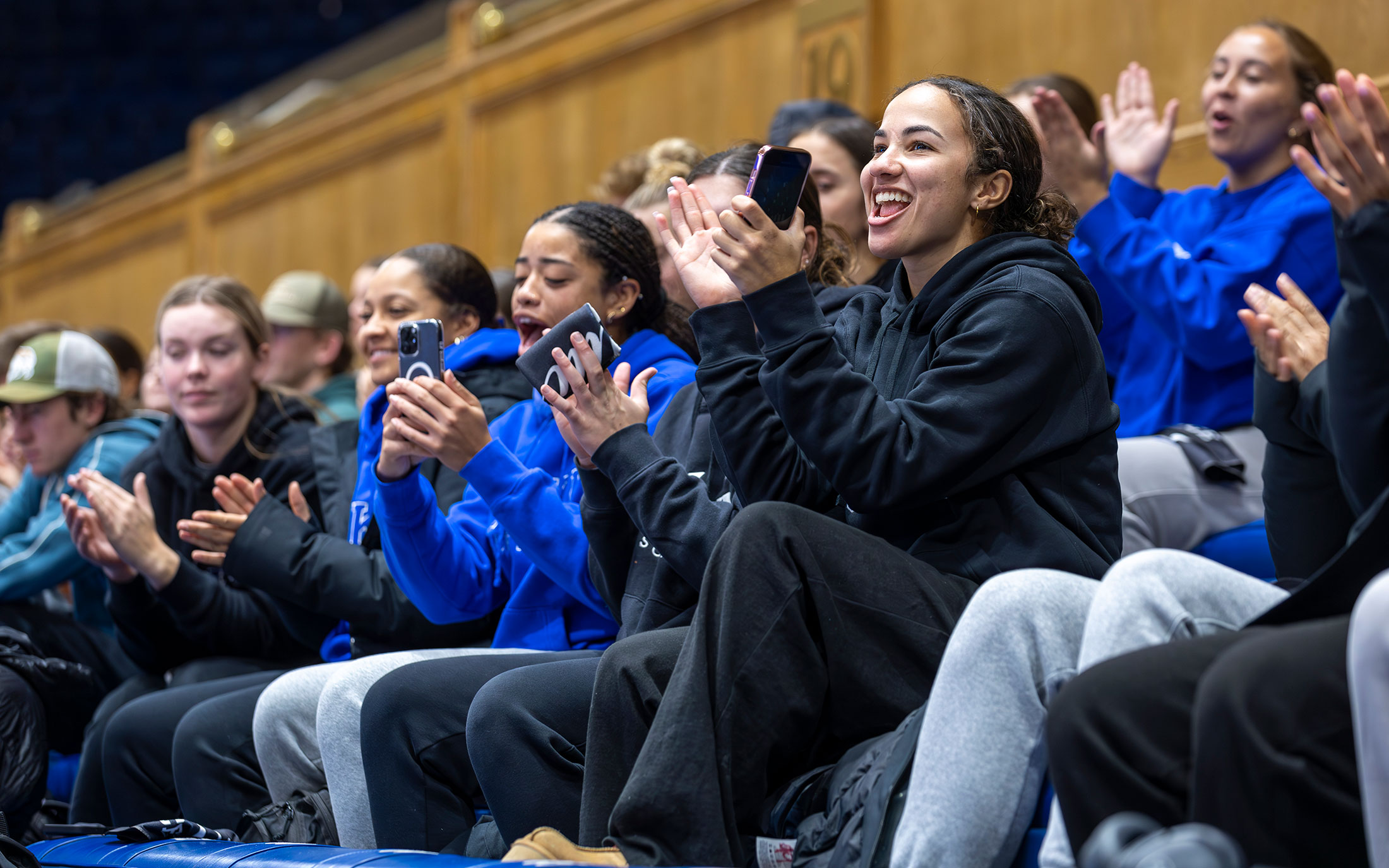 Students cheer on student speaker Amiah Burgess.