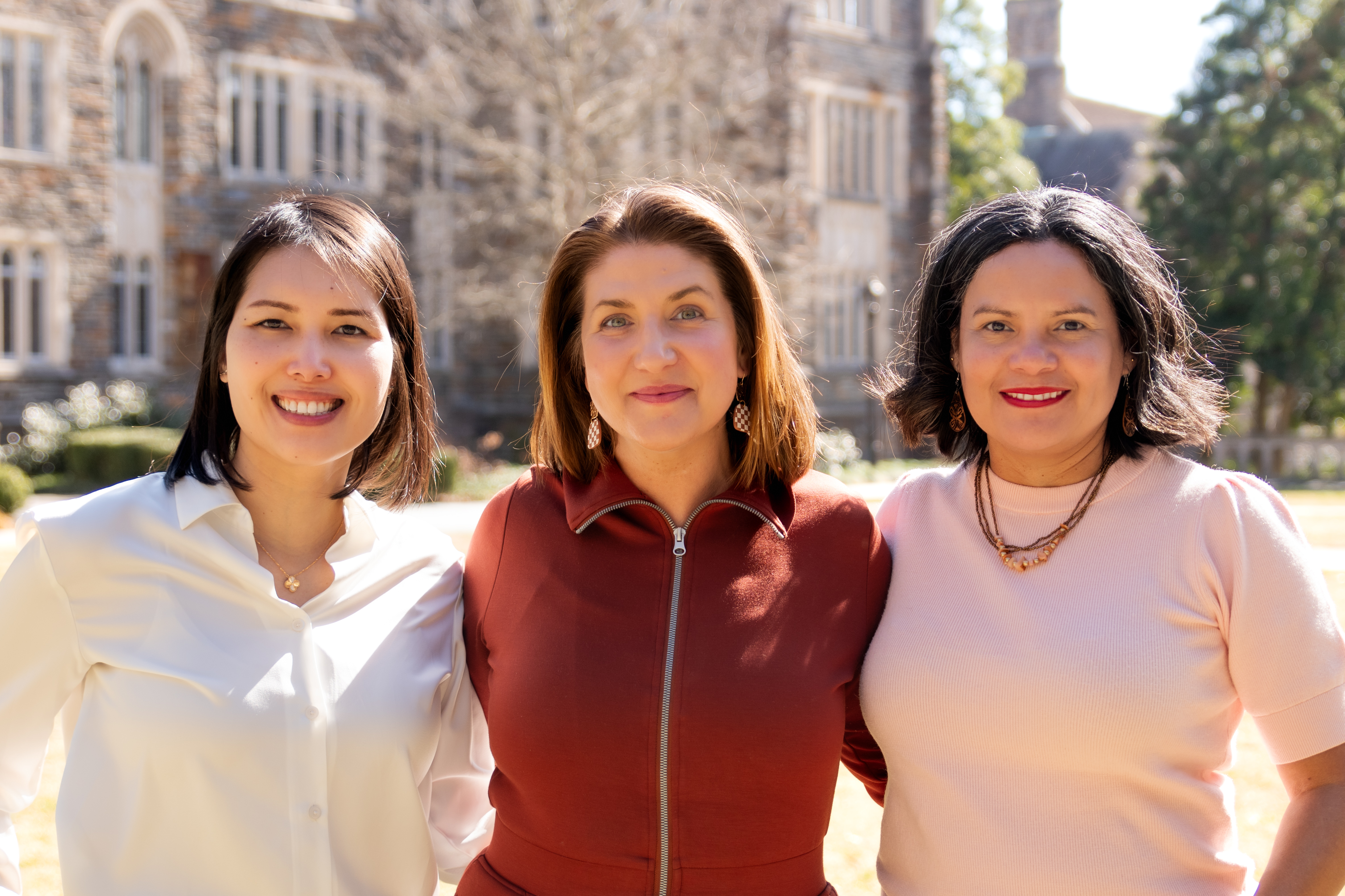 Mimi Jenness, Cara August and Natalia Silva Harwood stand on Duke's campus