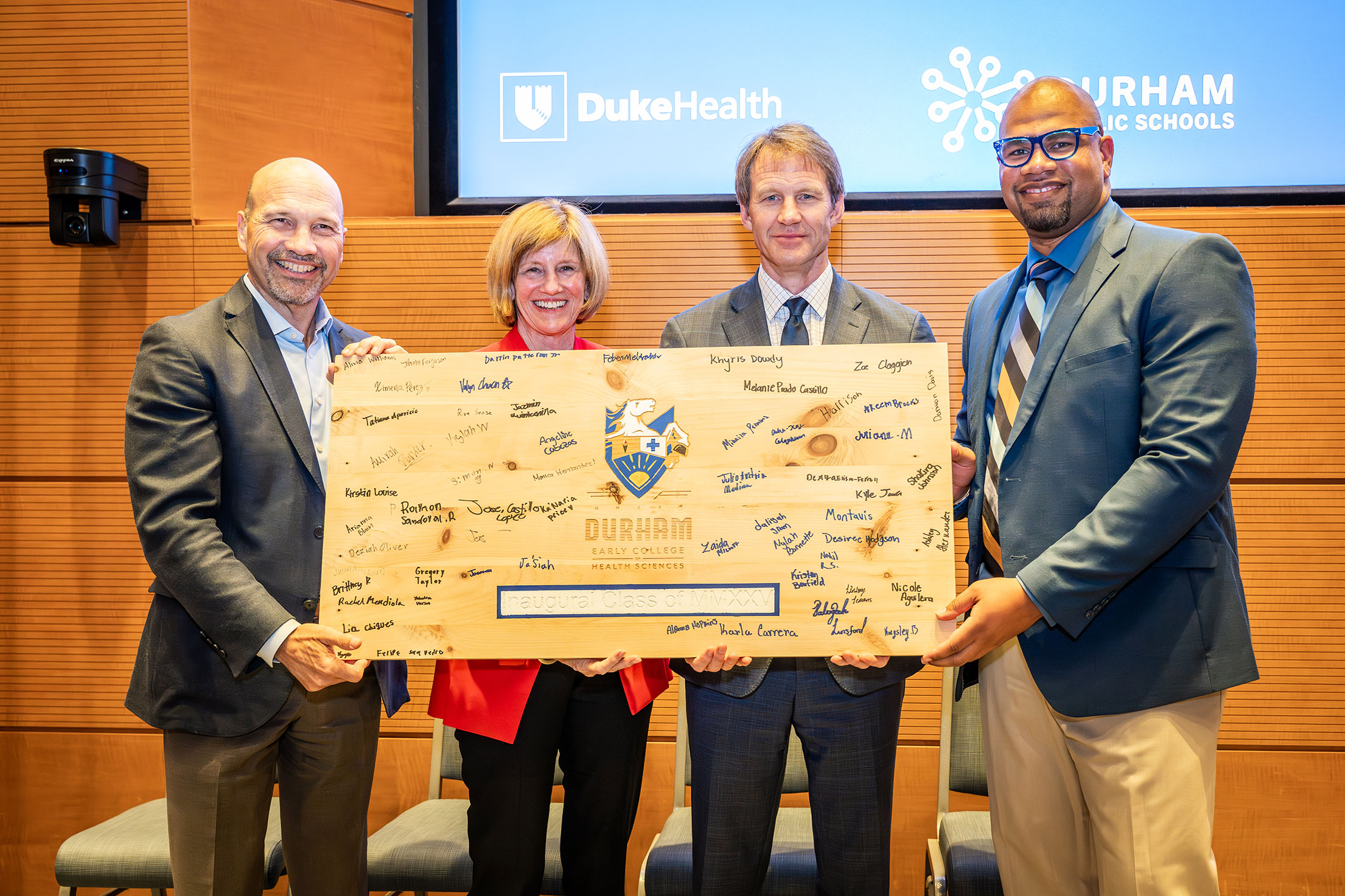 Drs. Craig Albanese and Mary Klotman join J.B. Buxton of Durham Tech and ECHS principal Joshua Brown in welcoming the new students.