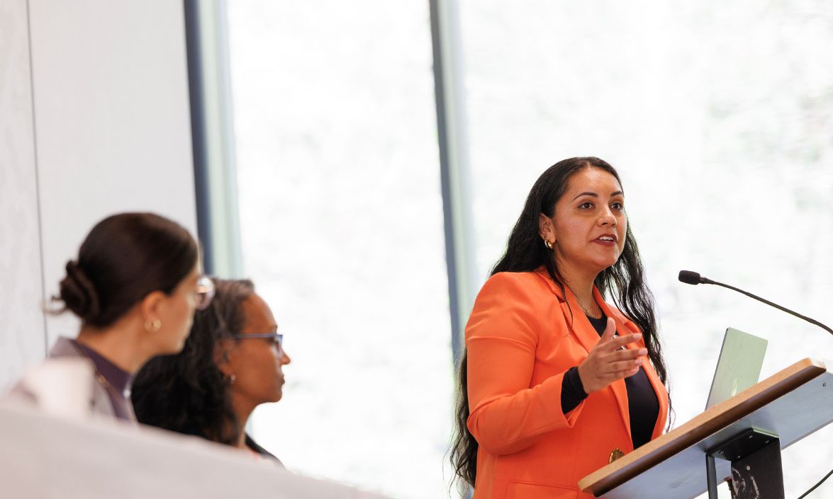 Person speaking at a podium