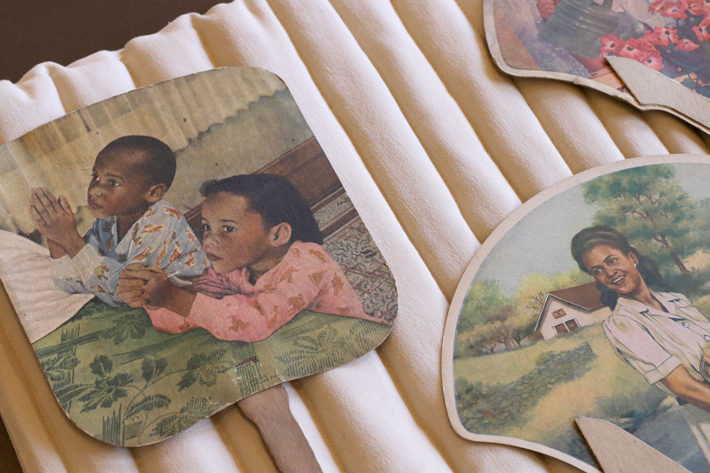 Church fans from Durham’s St. Joseph’s African Methodist Episcopal Church