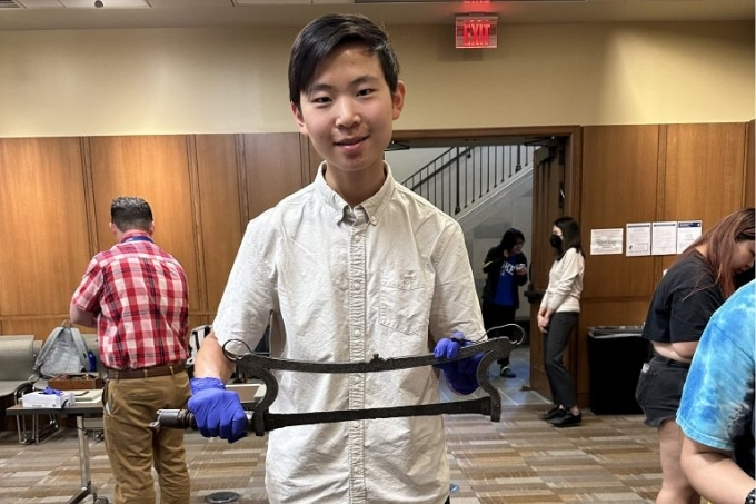 Author holding an amputation blade.