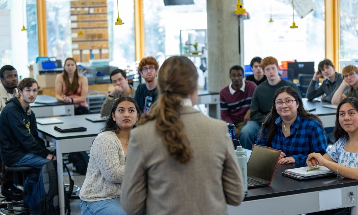A teacher is talking to her students.