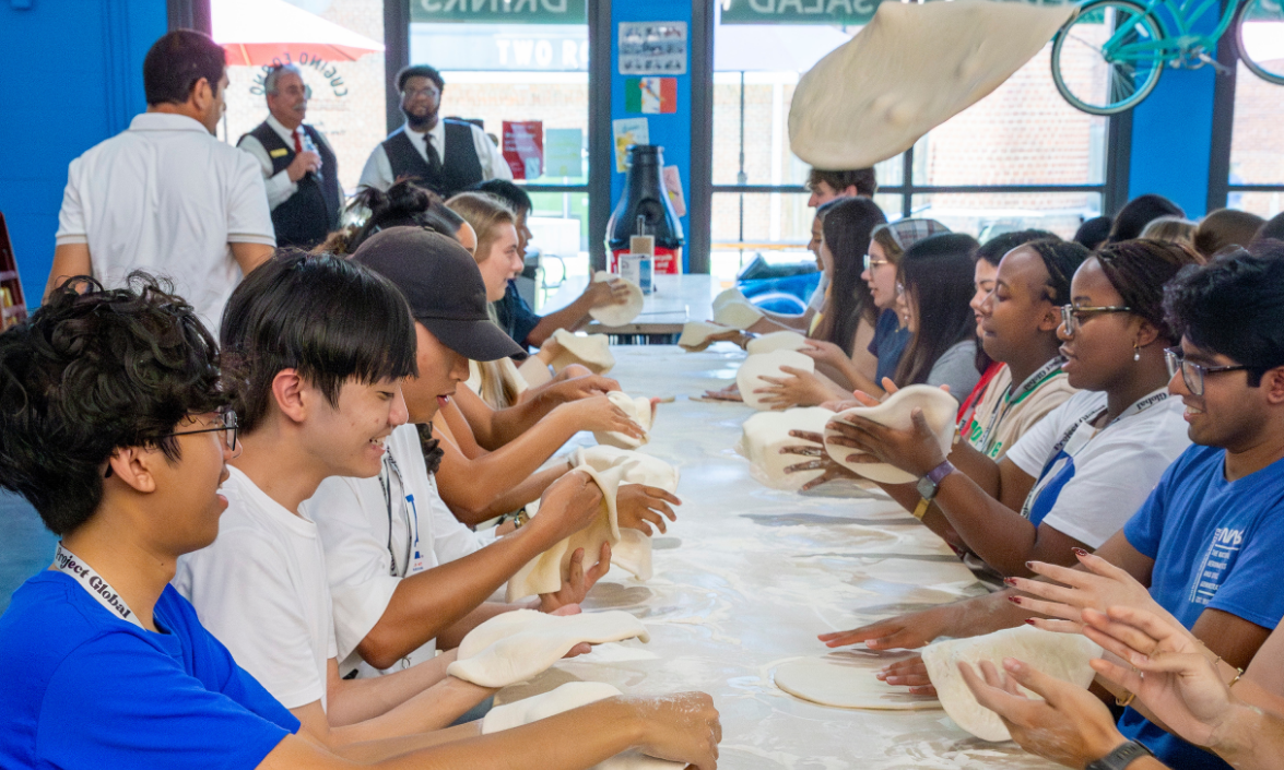 People making pizza