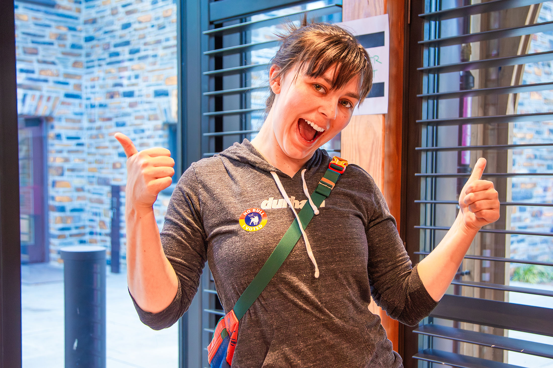 Durham resident Kate Gupton celebrates her vote at Duke’s Karsh Alumni and Visitors Center.