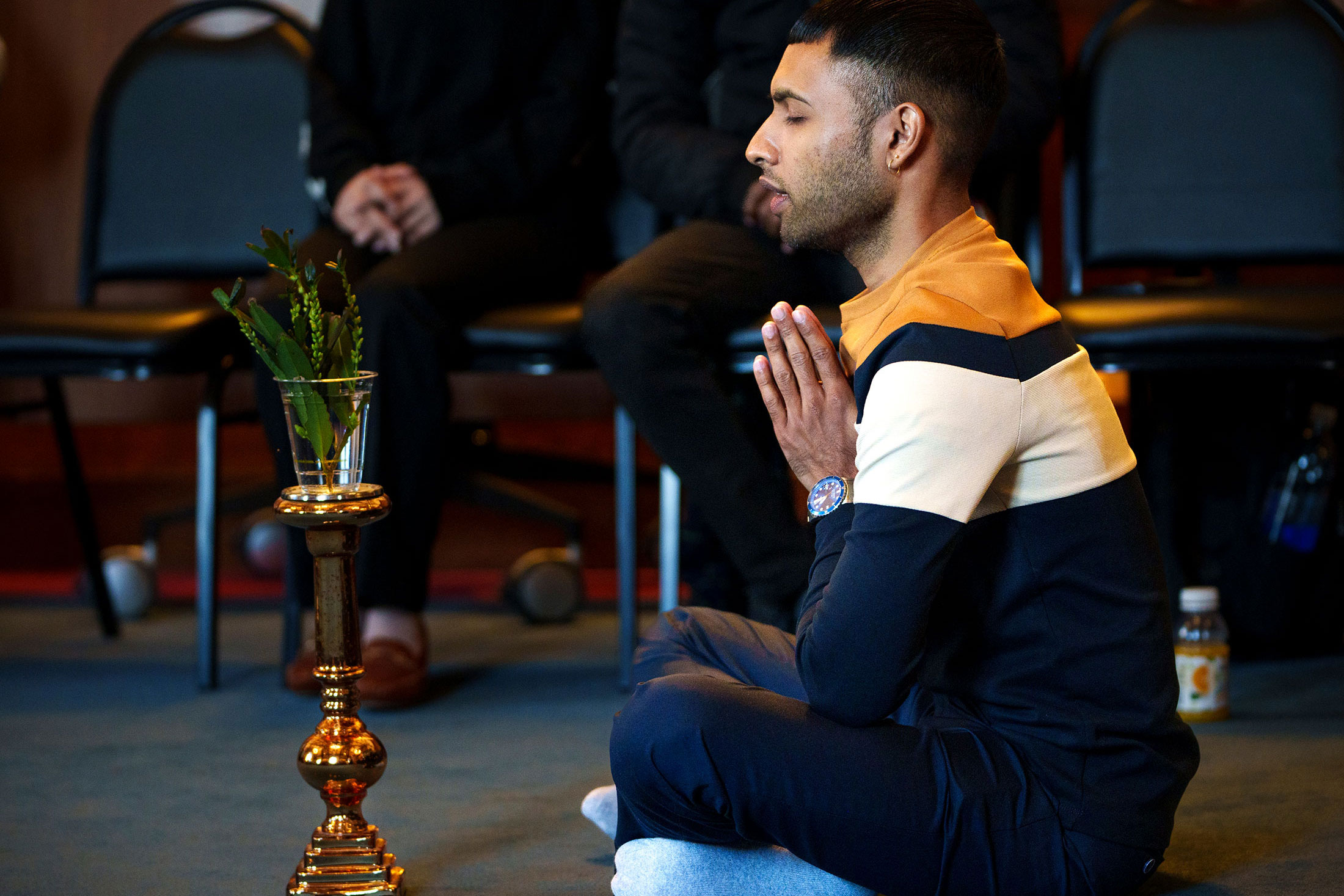Vedhan Singh, from South Africa, led participants in a Hindu prayer for water.
