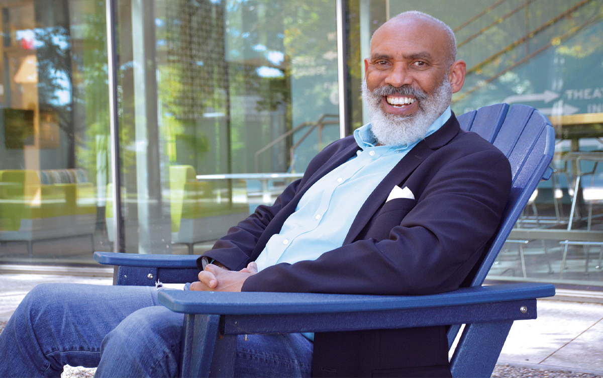 Richard Powell sitting outside.