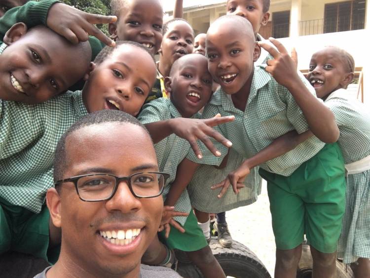 Matthew Turrentine, seen here with children during his mission trip last year, submitted this picture.