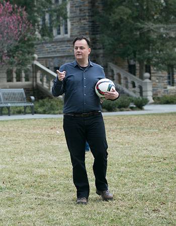 Laurent Dubois takes the Soccer Politics class outdoors for a lesson on the game. Photo by Julie Schoonmaker