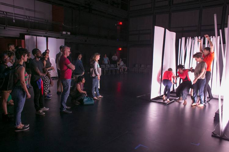 Ruby visitors, including some who just happened by the event, engage with the dancers during the performance. Photo by Jared Lazarus