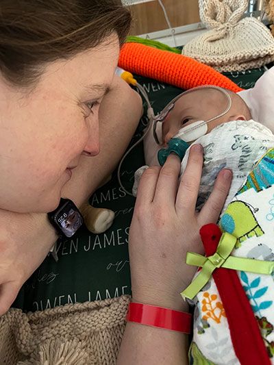 Owen Monroe looking at his mother Tayler.