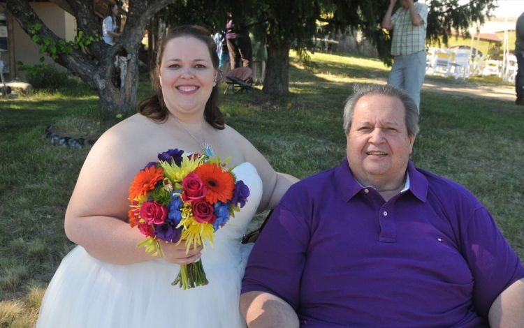 Leah Austin, left, stands next to her father, Allan, on her wedding day. Photo courtesy of Leah Austin. Leah Austin, left, stands next to her father, Allan, on her wedding day. Photo courtesy of Leah Austin.