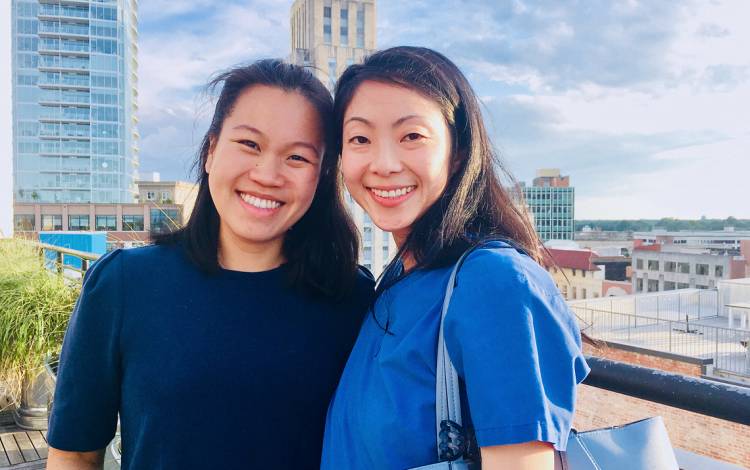 Duke Raleigh Hospital employees Mia Talcott, left, and Alberta McKinney, right, spend an afternoon on the rooftop of the Durham Hotel. Photo courtesy of Alberta McKinney.