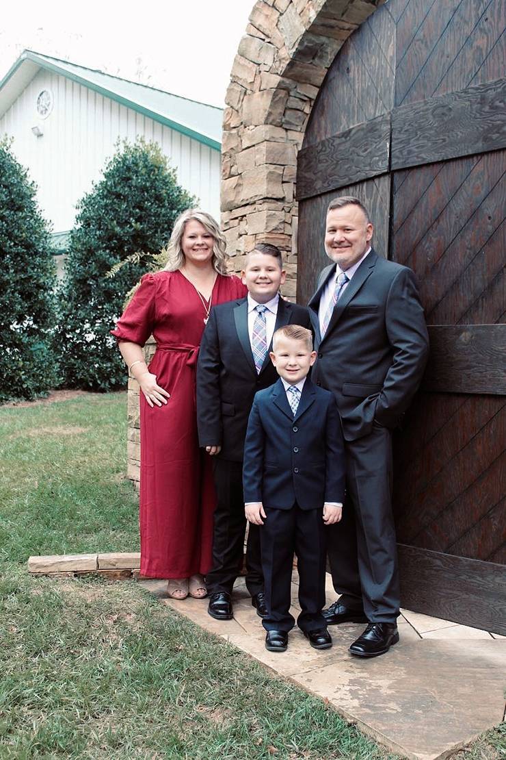 Amy Clayton, left, with her family in 2019. Clayton is earning a bachelor's degree to inspire her sons to attend a college or university. Photo courtesy of Amy Clayton.