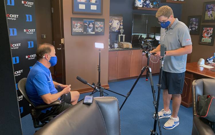 Blue Devil Network Executive Director Dave Harding records an interview with Duke Football Coach David Cutcliffe. Photo courtesy of Blue Devil Network.