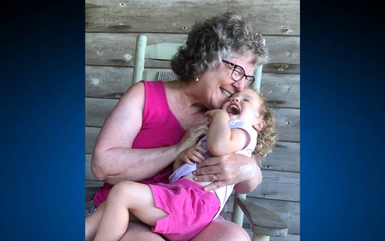 Babs Wise and her grandchild.