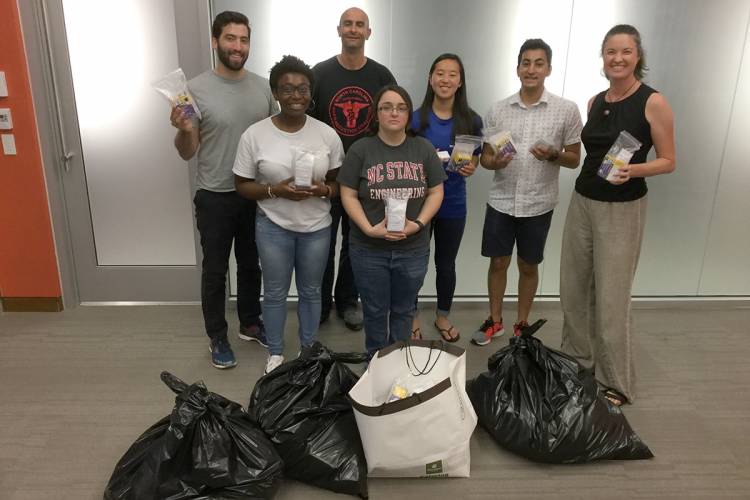 A Bass Connections team with naloxone kits they assembled.