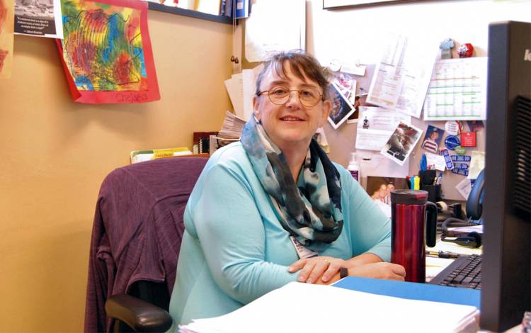 Bette Clack at her desk.