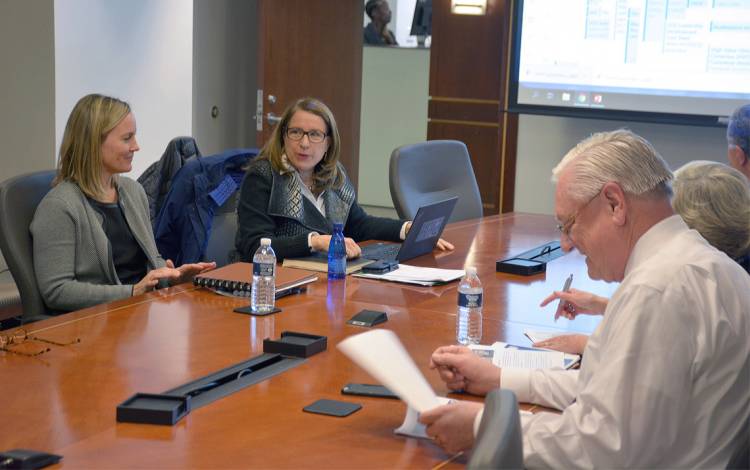 Jane Boswick-Caffrey, second from left, likes to give everyone in a meeting an equal opportunity to speak. Photo by Jonathan Black.