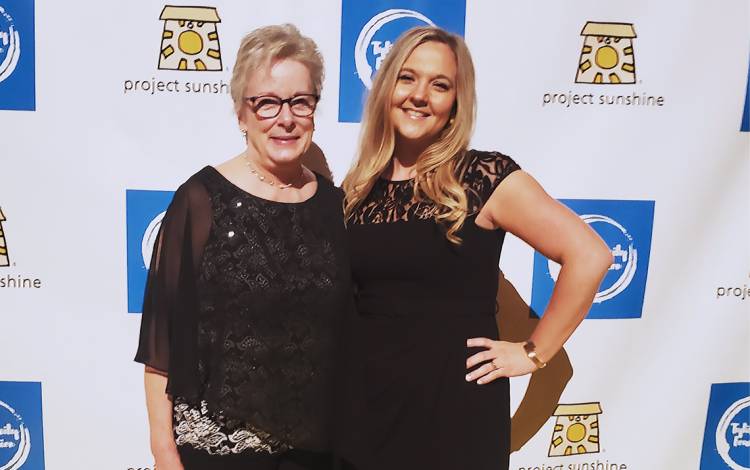 Cassondra Lewis, right, with her former manager Pam Ladd. Photo courtesy of Cassondra Lewis.
