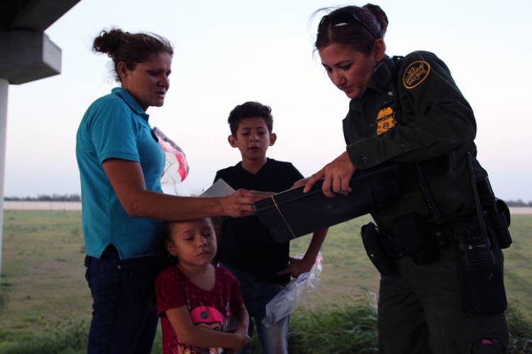 Central American refugees at a border crossing