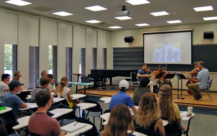 The Ciompi Quartet performs for Professor Tom Brothers' class. Photo by Stephen Schramm.