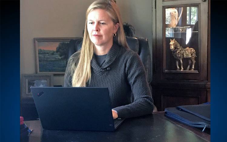 Allison Jamison, assistant dean of admissions for Fuqua School of Business, sits upright and dresses professionally when she works remotely from Cincinnati. Photo courtesy of Allison Jamison.