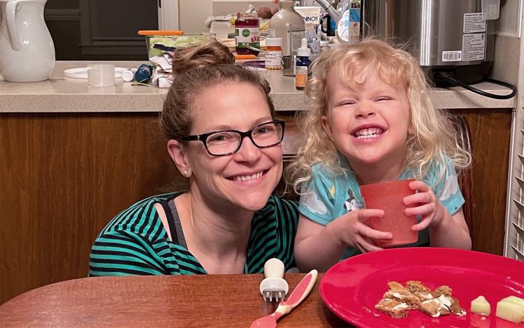 Working remotely allows Corrie Walston to spend more time with her daughter, Ruth, in the morning. Photo courtesy of Corrie Walston.