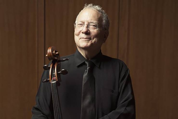 A cellist with his cello.