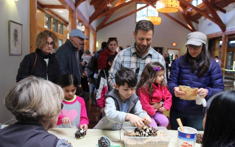 A family at a Duke Gardens event.