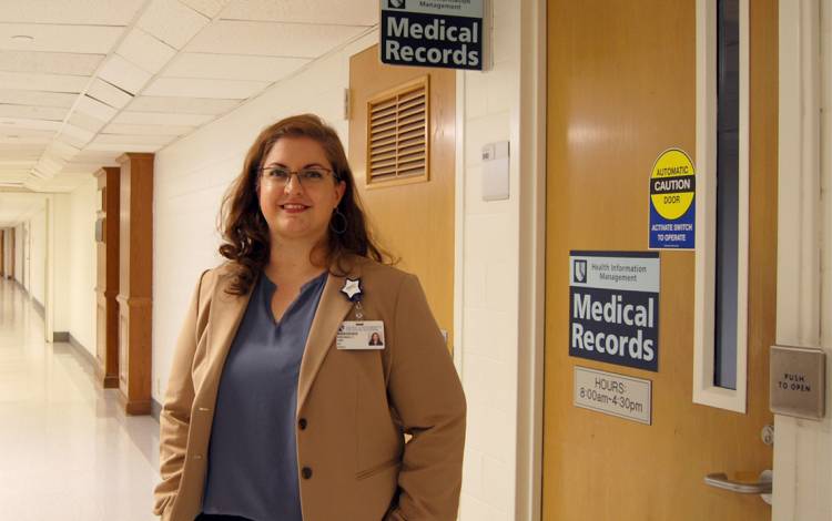 Ginny Lee sees around 100 emails per day in her role at the Health Information Management Department of Duke Health System. Photo by Stephen Schramm.