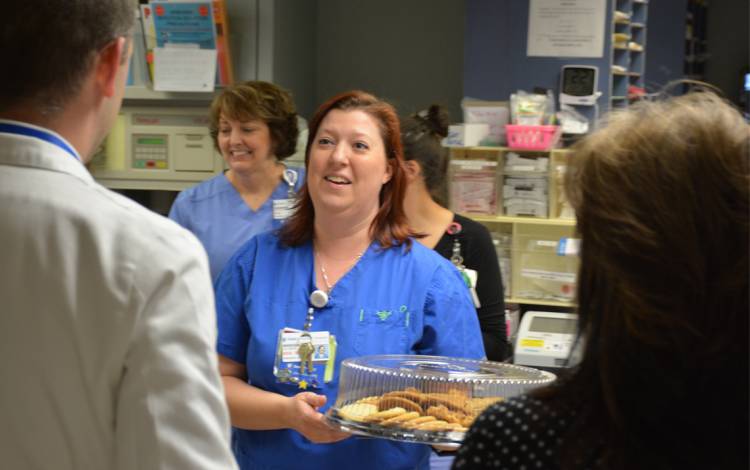 Allison Kiefer, with the Duke Regional Emergency Department, meets Neurosurgeon Chester Yarbrough.