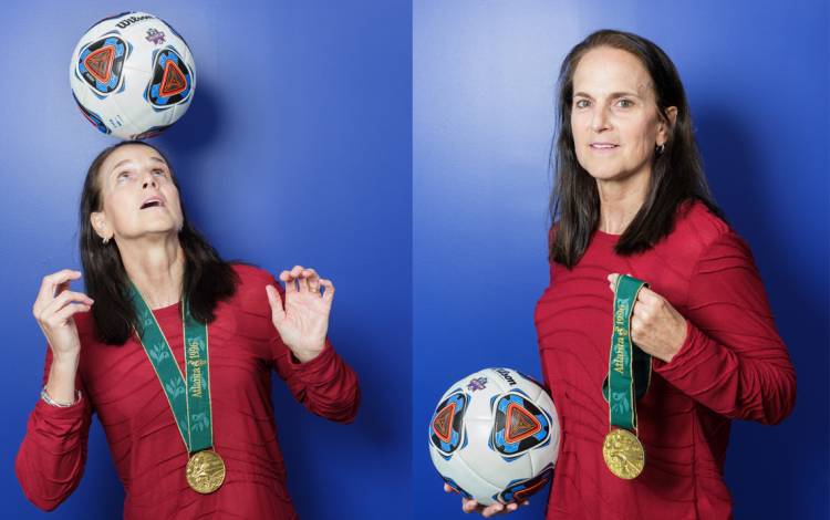 Carla Overbeck, assistant coach of the Duke women’s soccer team, with her Olympic Gold Medal.