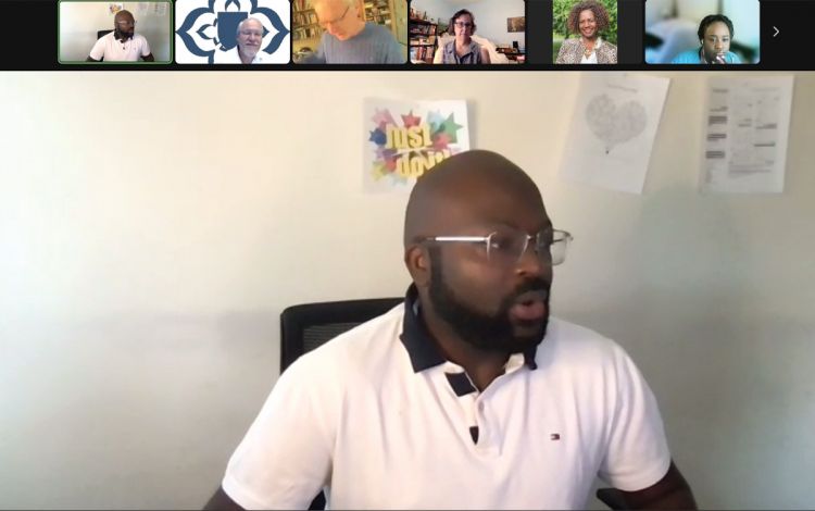 Ivo Kidze, president of the Duke Toastmasters Club, leads a meeting with members on Zoom. 