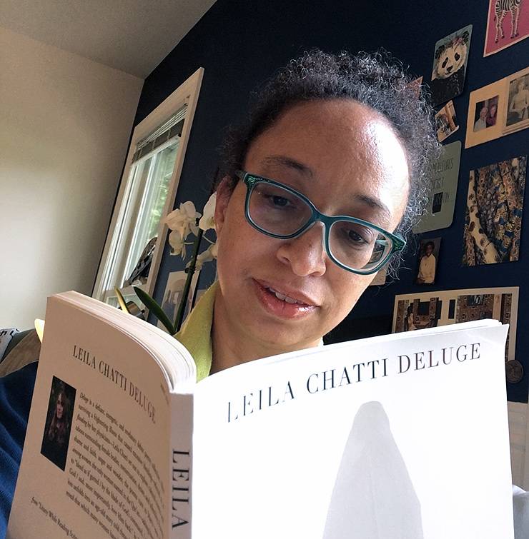 Tsitsi Ella Jaji reads Deluge, a book of poetry. Photo courtesy of Tsitsi Ella Jaji. 