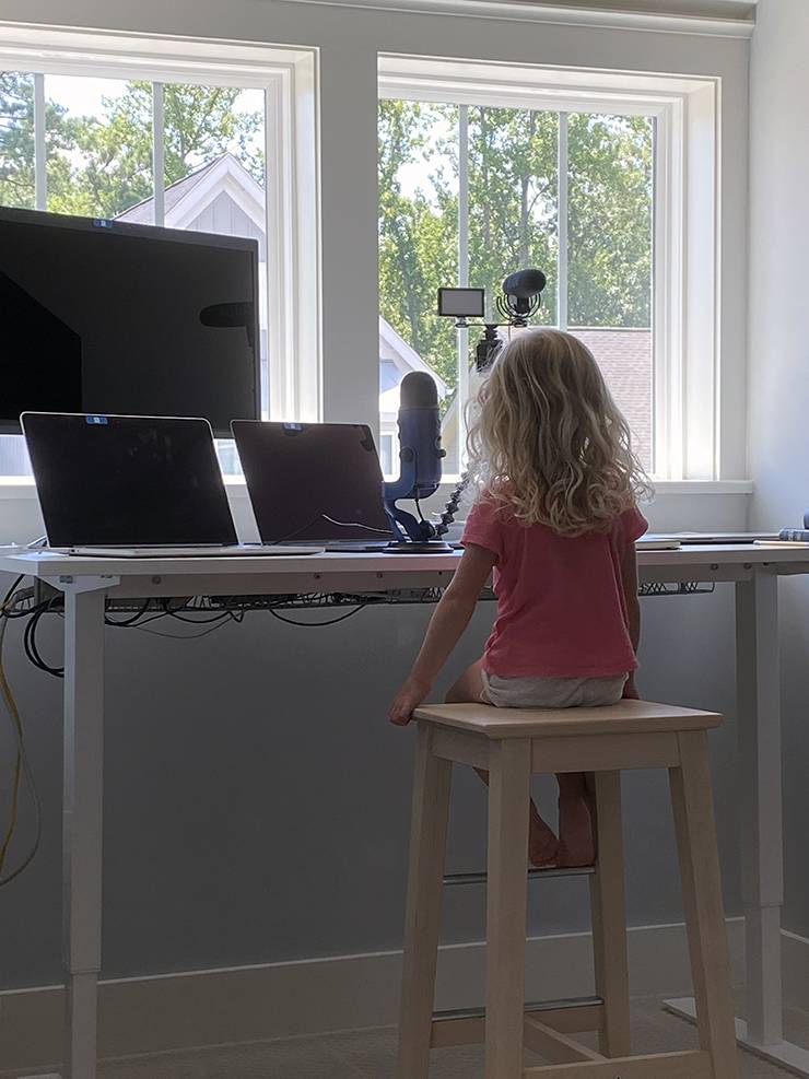 JasonVan San't daughter at his workspace.