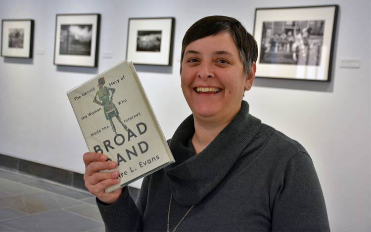 Jodi Psoter with the Low Maintenance Book Club's next selection, Broad Band. Photo by Jonathan Black.