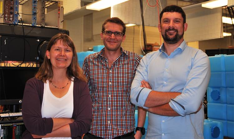 A photo of Kate Scholberg, Grayson Rich, and Phil Barbeau