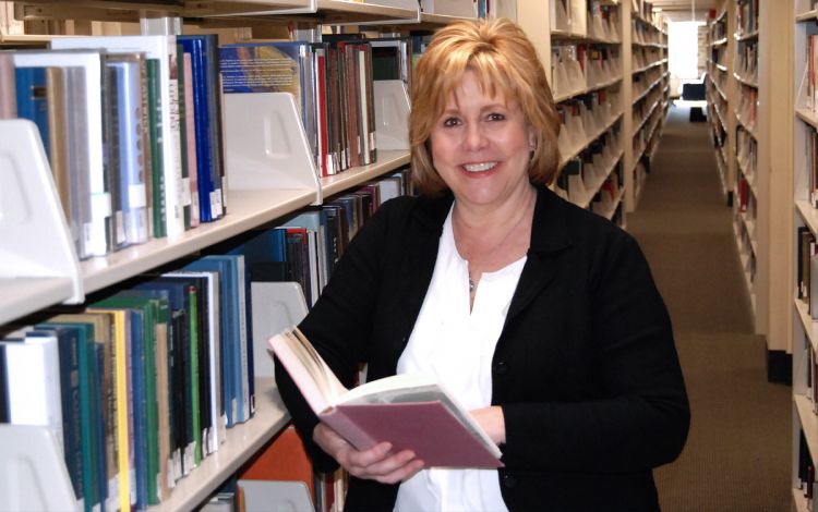 Kathy Phillips in the library.