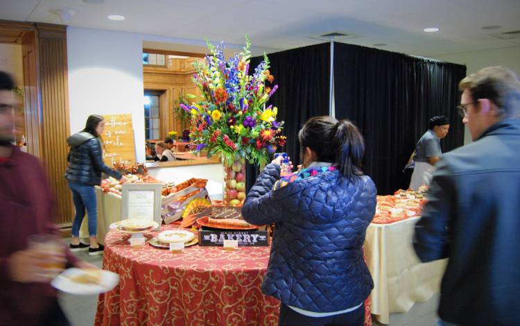 Diners stop and admire the work the Duke Dining staff put into last month's Thanksgiving meal. Photo by Stephen Schramm.