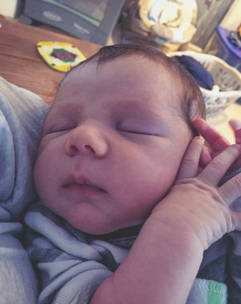 Mike Tuggle's baby in Duke Time Off photo campaign.