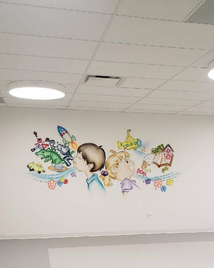 Duke employees Johnny Vega and Misha Price teamed up to make a mural in a New Jersey school in 2020. Photo courtesy of Johnny Vega.