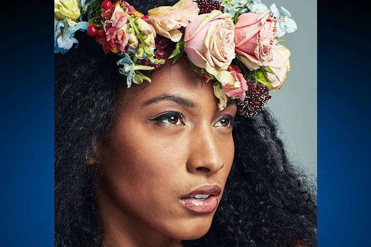 Woman with a crown of flowers.