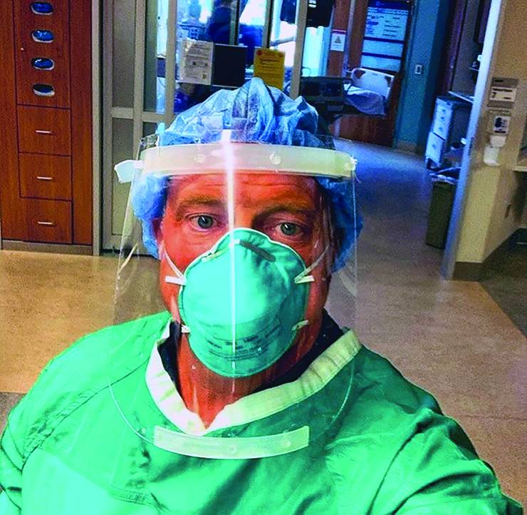 Anesthesiologist Paul Wischmeyer shares this self-portrait in April before checking on COVID-19 patients in all Duke University Hospital’s intensive care unit.