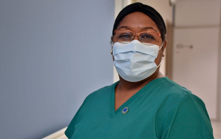 Princess Dixon has altered her career path to play a bigger role in the pandemic fight, becoming a Certified Nursing Assistant in 2022. Photo by Stephen Schramm.